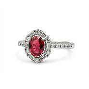 Ruby Ring set in Platinum surrounded by Diamonds