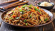 Savor the Sizzling and Spicy Fried Noodles in Abu Dhabi