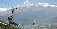 World’s most extreme (longest, steepest and fastest) zip-line is built at Sarangkot. A zip-line rider rides down the ...