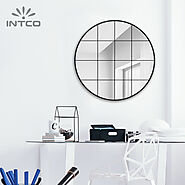 Intco round window pane mirror opens up a room like a newly-added window