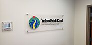Yellow Brick Road Acrylic Lobby Sign by First Impression Signs and Graphics in Omaha