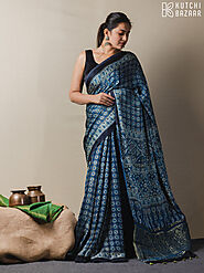 Buy Premium Handmade Ajrakh Modal Silk Saree Online in India.