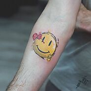 Smiley Face Tattoo Ideas With Trippy Nirvana Designs