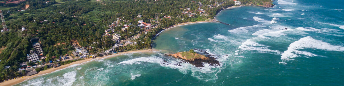 Headline for Ultimate Travel Guide to Mirissa, Sri Lanka - How to Plan a Memorable Trip to Sri Lankan Beach Hub Mirissa