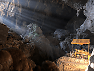 Explore the caves of Vang Vieng
