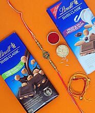 Order online Lindt Chocolate Rakhi Gift hamper with Colorful Om emblem rakhi thread to Canada and Usa