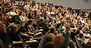How a Motivational Speaker Inspires an Audience