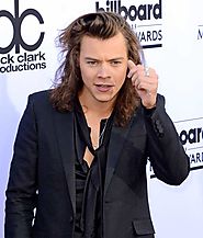 Harry Styles Calls Out One Direction Concertgoer For Stealing His Girlfriend At 14