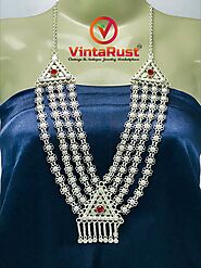 Website at https://vintarust.com/products/multilayer-bib-necklace-with-pendant