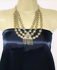 Website at https://vintarust.com/products/afghan-multilayer-bib-necklace-1