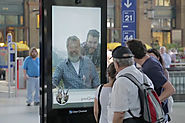 The Swiss Mountain Man in This Interactive Billboard Yodels and Gives People Free Train Tickets