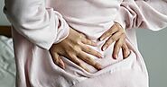 Back pain and bloating: Causes, symptoms, and treatments