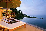 Infinity pool view of the Indian sea from luxury villa in Phuket, Thailand.