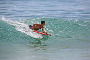 Go bodyboarding and ride the waves