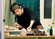 v in the kitchen showing his cooking skills