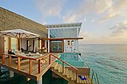 Stay at an overwater pool villa