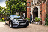 Experience First-Class Travel with a BMW Chauffeur Car