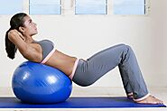 What are the benefits of using a Pilates ball?
