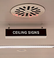 Enhancing Navigation and Safety with Ceiling Signs - Scoops Moon