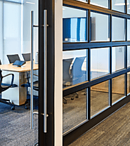 Enhance Your Space with Stunning Metallic Finishes for Glass Walls