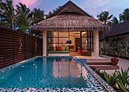 Stay in an overwater villa