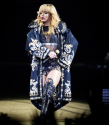 Rihanna hits a fan with microphone for grabbing her during Birmingham concert