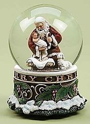 5.5" Joseph's Studio Musical Kneeling Santa with Baby Jesus Christmas Snow Globe Glitterdome