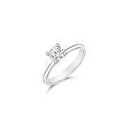 A classy round cut solitaire ring 0.7 carat diamond centerpiece by Jolan Jewelry