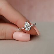 Delicate Pear Cut Diamond Ring by Jolan Jewelry