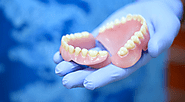 How Do Dentures Stay in Place: The Science Behind Your Smile