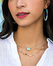How do gemstone necklaces contribute to personal style and fashion trends?