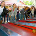 Skee Ball – rulla träklot i rätt ring.