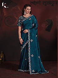 Teal Blue Pure Satin Georgette Blooming Fabric With Heavy Sequins Embroidery Cutwork Border Saree With Stitched Blouse