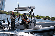 Design and Features: What Makes Rigid Boats Ideal for Law Enforcement Operations - Fluid Watercraft