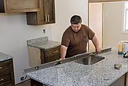 How Do You Attach the Sink During Granite Countertop Installation?