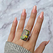 Captivating Ammolite Rings: Nature's Spectacle