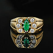 Vintage Jewelry piece - A Marquise Emerald Diamond Ring in 14K Gold