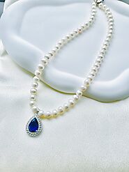 Stunning Pearl Necklace with ocean blue pendant