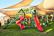 Fun-filled adventure awaits! This colorful outdoor playground offers endless entertainment for kids of all ages.