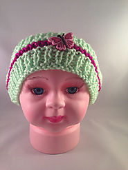 Green and pink headband with butterfly