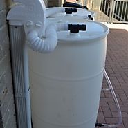 Collecting rain water with the help of plastic rain barrels