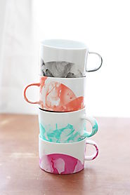 DIY Marbled Mugs with Nail Polish - diycandy.com