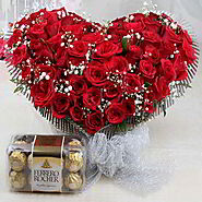 Buy / Send Ferrero Rocher Chocolate Box And Fifty Red Roses Heart Shape Arrangement Online from OyeGifts