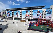 Think Different Print: Stadium Wraps & Large Building Advertisements