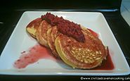 Coconut Pancakes with Fresh Raspberry Reduction