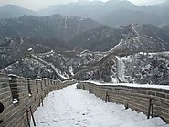 The Great Wall of China covered in snow.