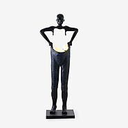 Man Carrying Floor Lamp – HIOOZ