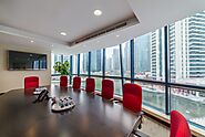 How can colors, designs, and layouts help people work better in shared spaces