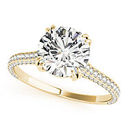 Yellow gold Round Diamond Solitaire with Pave Band and Six-Prong Setting