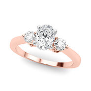 Rose gold Three-Stone Oval Solitaire Ring with Tapered Band and Four-Prong Setting